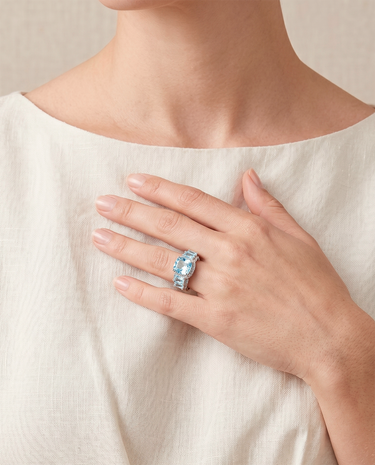 Anillo Cushion topacios azules, plata