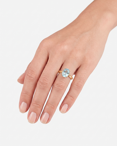Anillo Elipt topacio azul, plata dorada