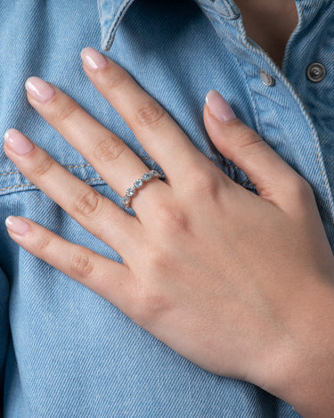 Anillo Riviere topacios azules, plata