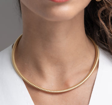 Collar Met, plata dorada