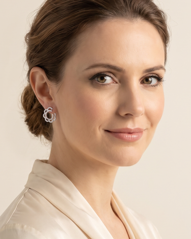 White gold and diamond wave earrings