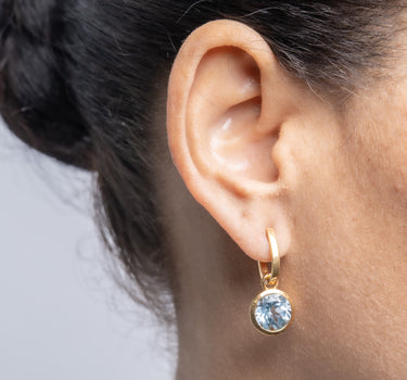 Pendientes Sara topacio azul, plata dorada