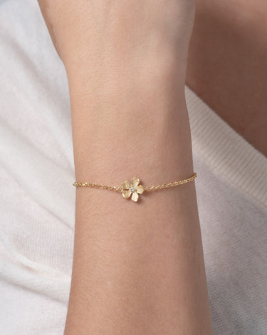 Pulsera Flor, plata dorada