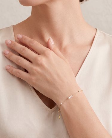 Pulsera Trio perlas, oro 9K
