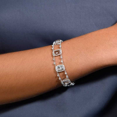 Pulsera Victoria topacios blancos y diamantes, oro blanco