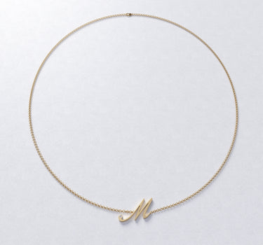 Colgante personalizado M con diamante, oro
