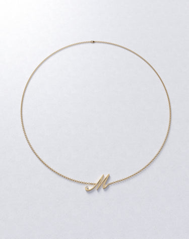 Colgante personalizado M con diamante, oro